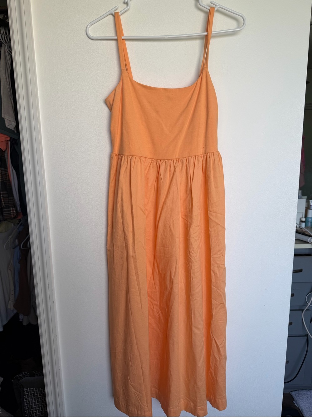Women’s Sleeveless Midi Dress in light orange color